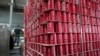 FILE - Pallets of branded aluminum cans at the production line in the Palestinian Chat Cola bottling plant, in the West Bank city of Salfit, Feb. 13, 2025. 