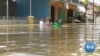 Floods Force Tens of Thousands of Indonesians to Remain in Shelters 