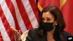 U.S. Vice President Kamala Harris meets with activists who work on LGBT, transgender, disability rights and climate change at the U.S. Chief of Mission's residence in Hanoi, Vietnam, Aug. 26, 2021.