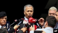 FILE -Turkish Interior Minister Ali Yerlikaya talks to journalists in Ankara, Sunday, Oct. 1, 2023. On Feb. 18, 2025, he said police have detained 282 suspected members of the Kurdistan Workers Party, or PKK.