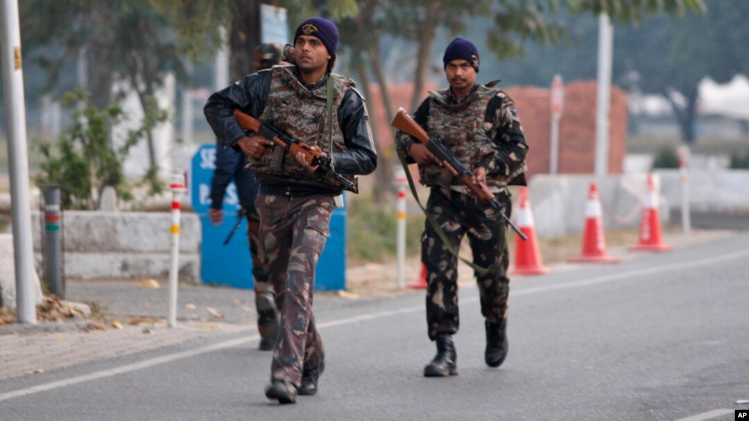 FILE - Indian security forces patrol inside the Indian air force base that came under attack Saturday in Pathankot, India, Jan. 3, 2016.