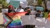 People march in downtown Nairobi, Kenya, during a protest organized by The Queer Republic in Nairobi, Jan.13, 2022. Education Cabinet Secretary Prof. George Magoha sparked controversy after saying that homosexuals students should be barred from boarding schools.