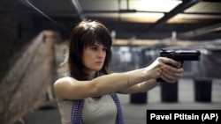 RUSSIA -- Maria Butina, who pleaded guilty on December 13, 2018, to conspiracy to act illegally as an unregistered Russian agent, photographed at a shooting range in Moscow, April 22, 2012.