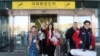 FILE - A group of Russian tourists, likely the first foreign travelers from any country to enter North Korea since the pandemic, arrives at the Pyongyang International Airport in Pyongyang, North Korea, on Feb. 9, 2024. 