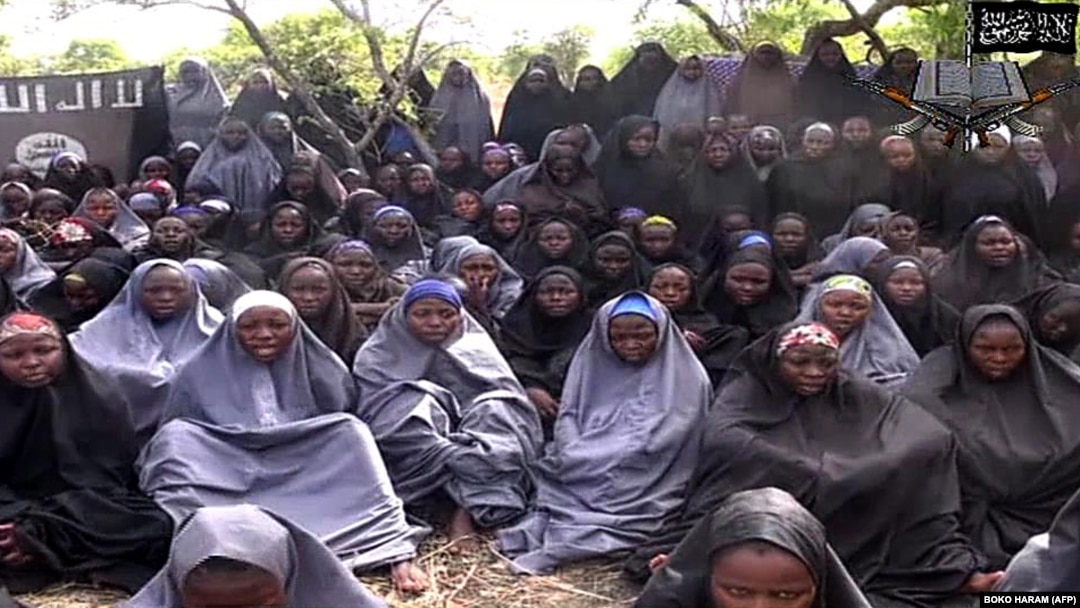 A video from Boko Haram claims to show the abducted Nigerian schoolgirls wearing full-length hijabs and praying in an undisclosed location, in a screengrab taken May 12, 2014. 