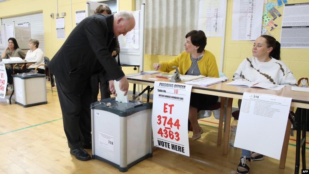 Voters cast their ballots in the European elections, and in Ireland's local elections and the divorce referendum at a polling station in Dublin, May 24, 2019.