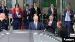 Taoiseach Micheal Martin, leader of the Fianna Fail party, leaves the Convention Centre, en route to the president's residence to receive his seal of office in Dublin, Ireland, June 27, 2020.