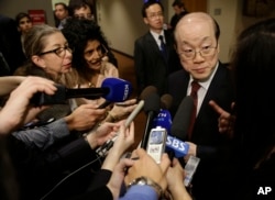 Liu Jieyi, China's U.N. ambassador, takes questions during a break inSecurity Council consultations, Feb. 25, 2016. A U.N. resolution proposed against North Korea after its recent nuclear test and rocket launch will affect exchanges with its traditional a