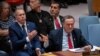 Israel Katz, Foreign Minister to the United Nations points at family members of hostages in the audience during a meeting of the United Nations Security Council on the conflict between Israel and Hamas, at U.N. headquarters in New York, March 11, 2024. 