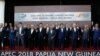 Leaders pose for a family photo at the APEC 2018 Economic Leaders Meeting at the APEC Haus at Port Moresby, Papua New Guinea, Nov. 18, 2018.