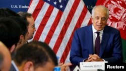 FILE - US special envoy for peace in Afghanistan, Zalmay Khalilzad, talks with local reporters at the U.S. embassy in Kabul, Afghanistan. 