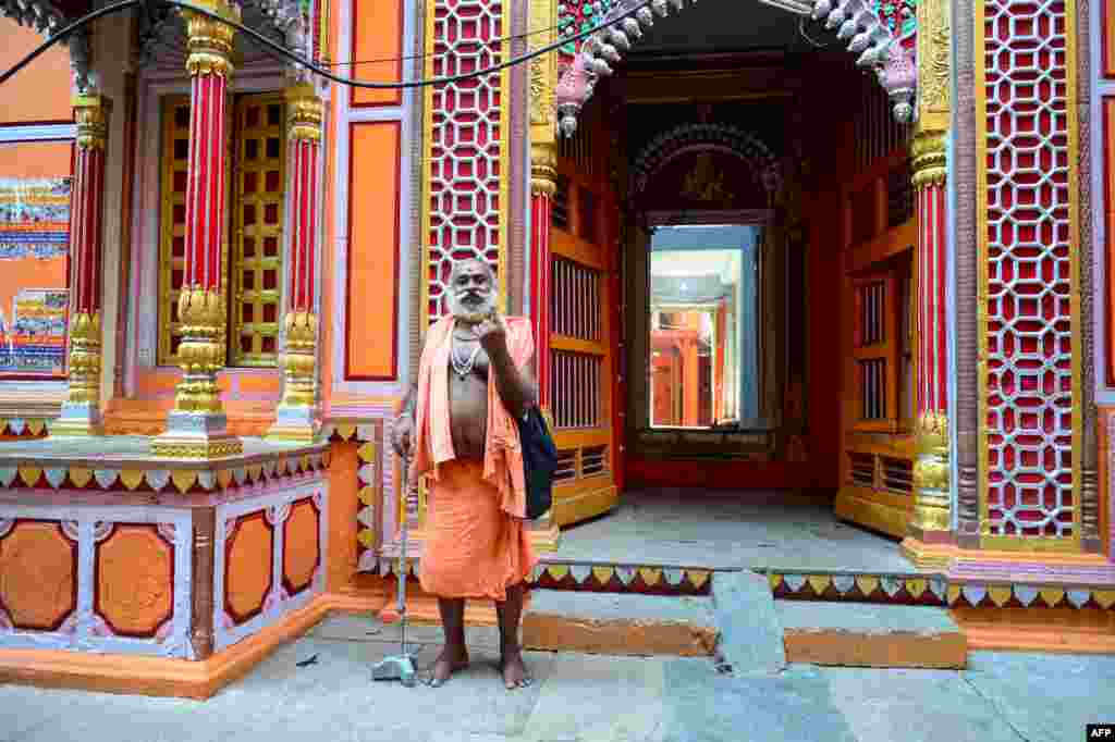 A Sadhu (Hindu holy man) show his ink-marked finger after casting his vote in Varanasi in Uttar Pradesh state during the 7th and final phase of India's general election.