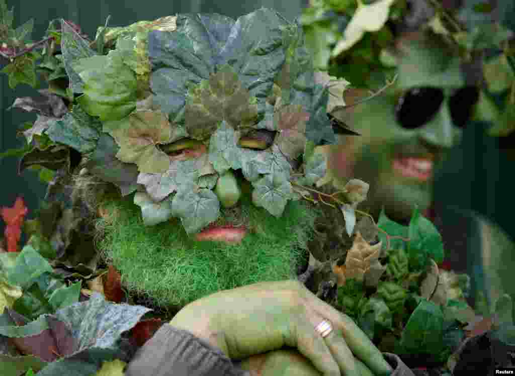 Participants attend the annual May bank holiday "Jack In The Green" parade and festival in Hastings, Britain.