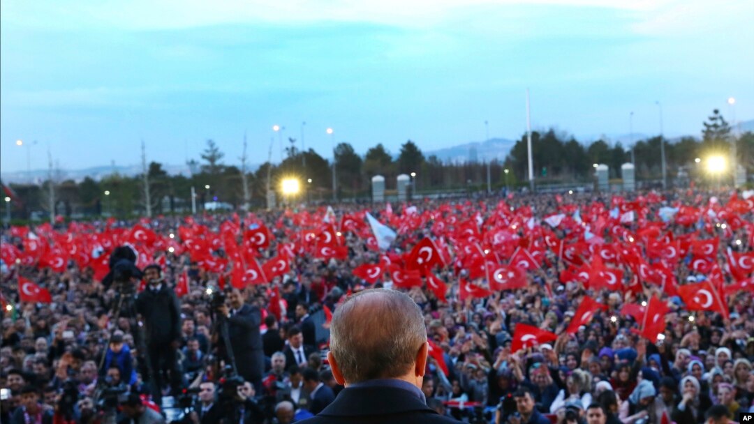 Turkey's President Recep Tayyip Erdogan delivers a speech during a rally a day after the referendum, outside the Presidential Palace, in Ankara, Turkey, Monday, April 17, 2017