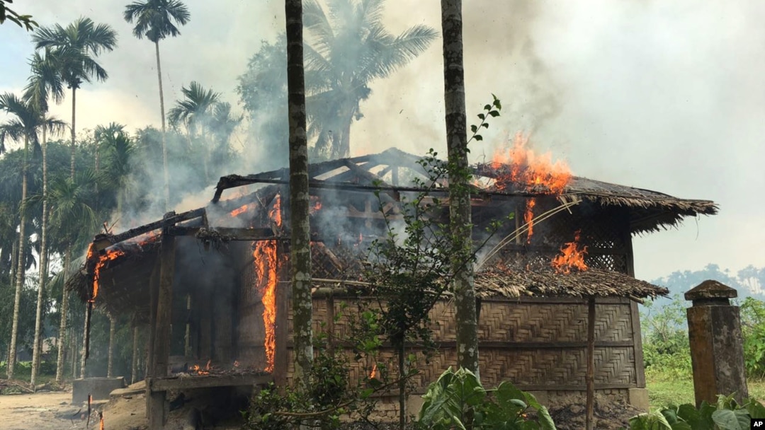 Flames engulf a house in Gawdu Zara village, northern Rakhine state, Myanmar, Sept. 7, 2017. Security forces and allied mobs have burned down thousands of homes in Northern Rakhine state, where the vast majority of the country's 1.1 million Muslim Rohingyas lived.