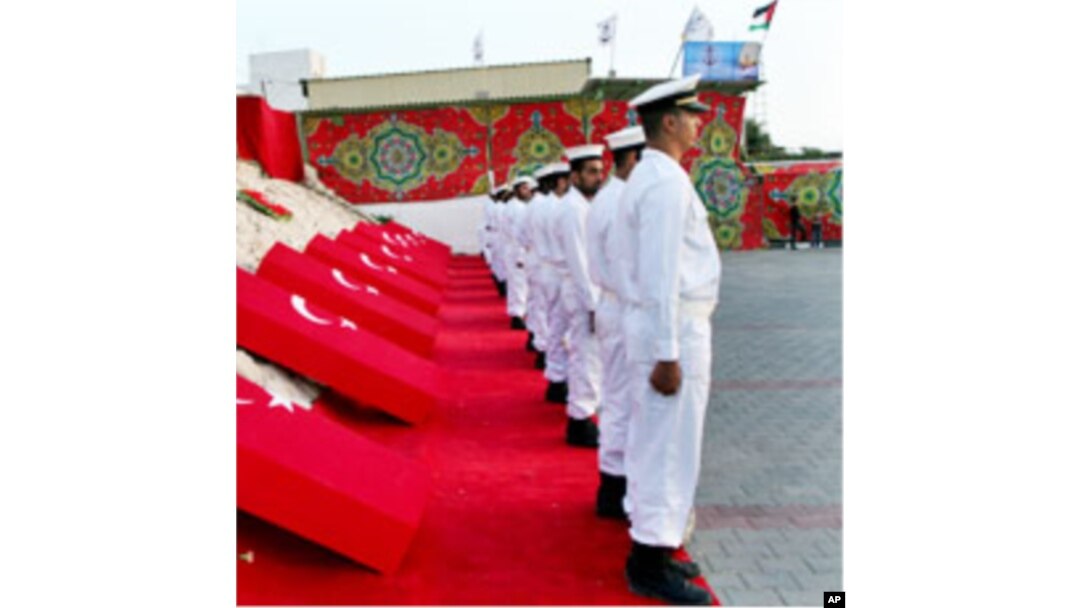 Hamas navy officers are seen during a ceremony honoring the nine Turkish activists killed atop a flotilla aid ship, Gaza City port, June 6, 2010.