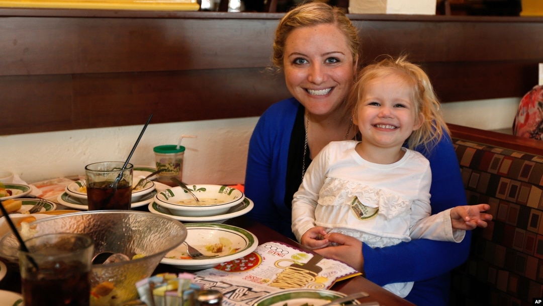 Cailyn Pierson and her mother visit Olive Garden in Naperville, Ill., on Take Our Daughters and Sons to Work Day in this photo distrubuted by the Olive Garden, April 25, 2013.