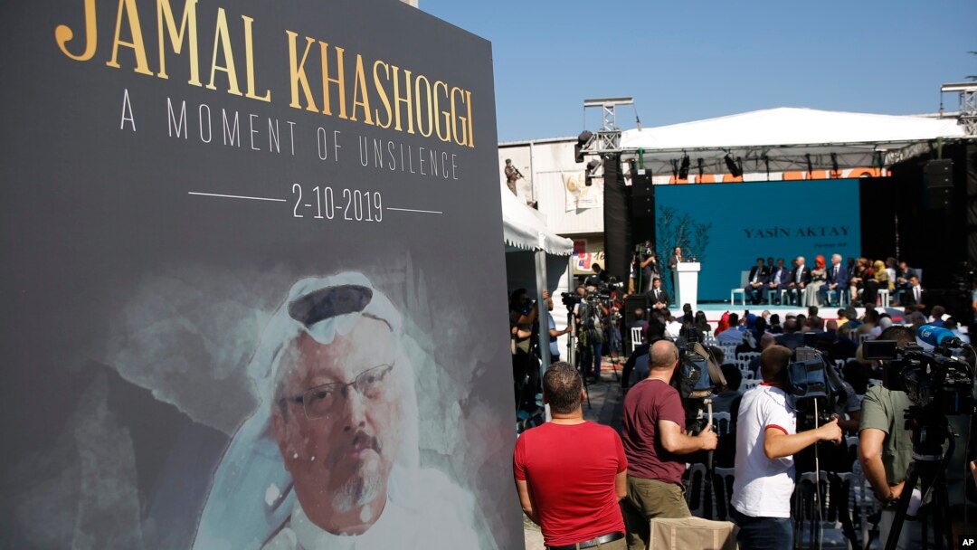 A picture of slain Saudi dissident and Washington Post columnist Jamal Kashoggi is seen during a ceremony near Saudi Arabia's consulate in Istanbul, Turkey, marking the one-year anniversary of his death, Oct. 2, 2019. 