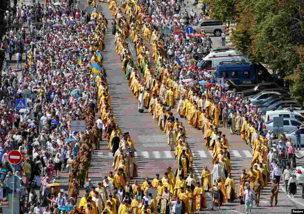 Clergymen and believers of Orthodox Church of Ukraine take part in a ceremony marking the 1031st anniversary of the Christianisation of the country, which was then known as Kievan Rus', in Kyiv, Ukraine.