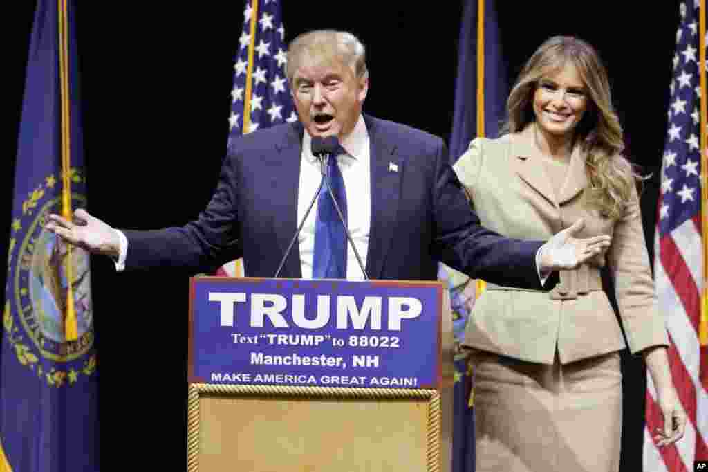 Republican presidential candidate, businessman Donald Trump introduces his wife Melania during a campaign rally, Feb. 8, 2016, in Manchester, N.H.
