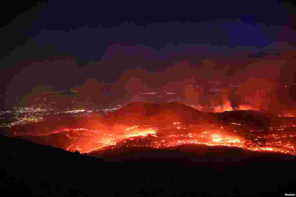 Lava flows from Mount Etna, Europe's highest and most active volcano, near the Sicilian town of Catania in southern Italy, July 27, 2019.