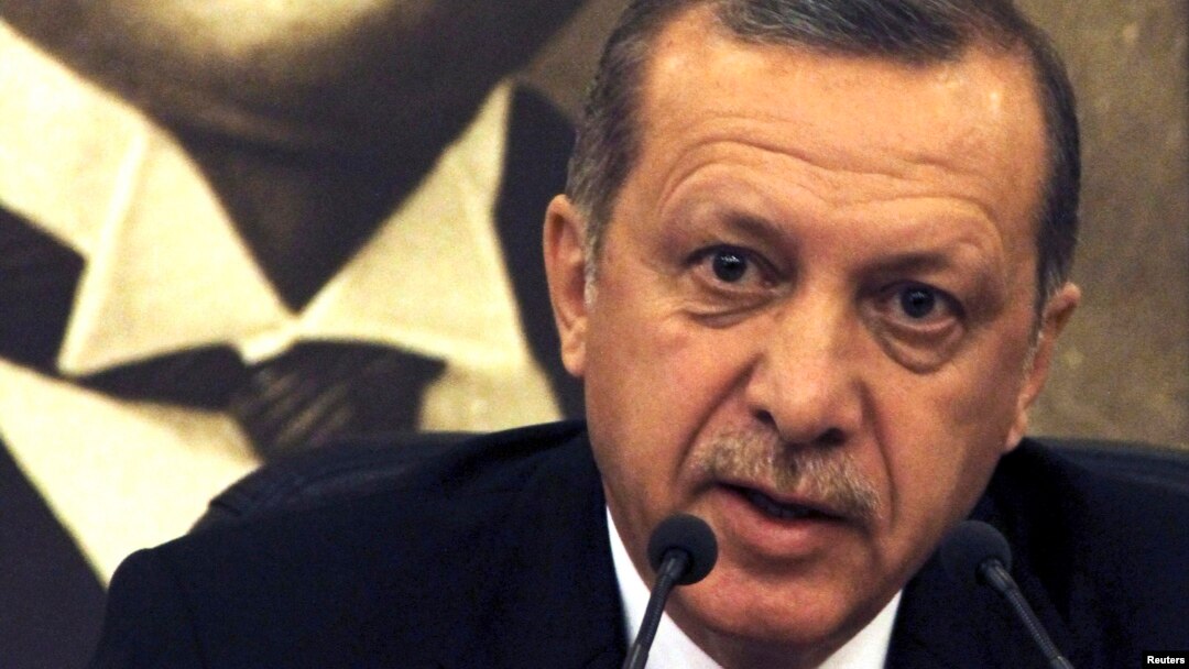 Turkey's Prime Minister Recep Tayyip Erdogan, speaks during a news conference at Ataturk International airport in Istanbul, April 4, 2014. 