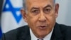 ARCHIVO: El primer ministro israelí, Benjamín Netanyahu, durante una reunión de su gabinete en la base militar de Kirya el 24 de diciembre de 2023.