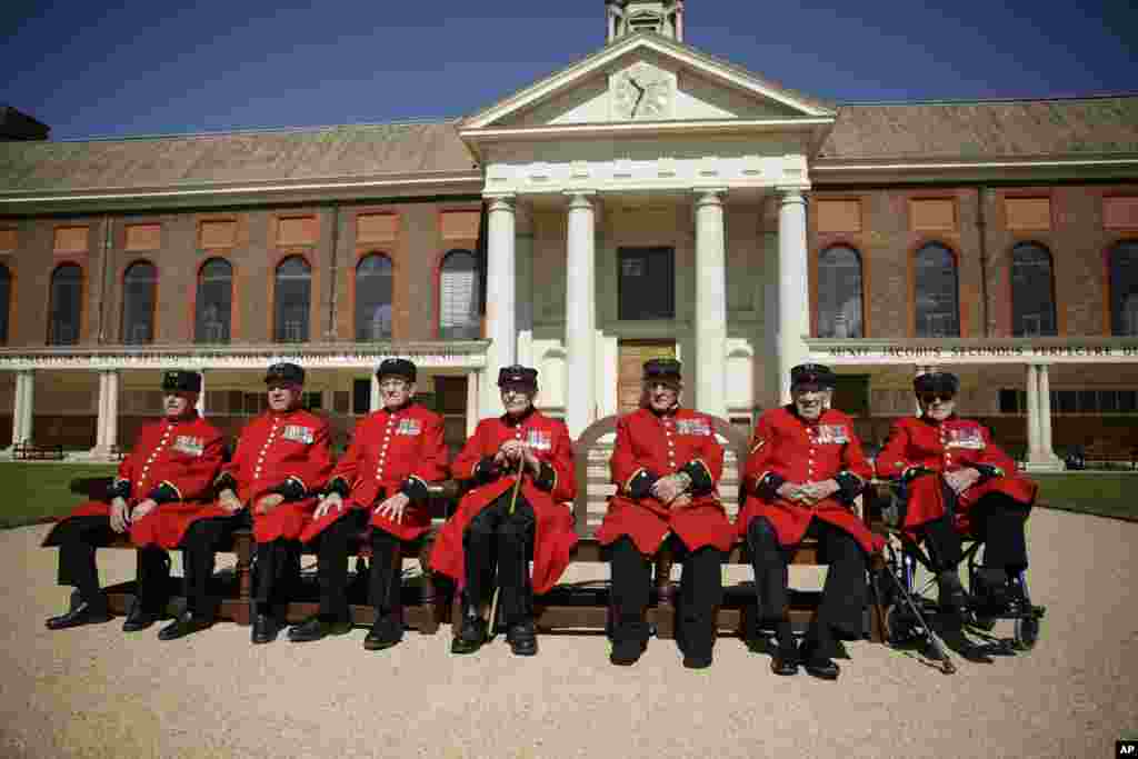 British Chelsea Pensioners who are veterans of the World War II Battle of Normandy, codenamed Operation Overlord and best known today as D-Day, pose for a group photograph during a D-Day 75th anniversary at the Royal Hospital Chelsea in London.