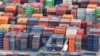 As tariffs take effect, Beijing and Washington look back to 2020 deal