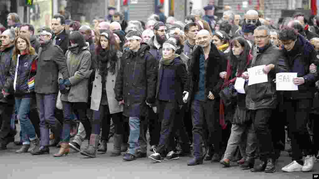 'Charlie Hebdo' ma'aikatan a Paris, Janairu 11, 2015.