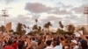 Crowds grew larger in early evening in Tripoli, Libya, Aug. 23, 2020. (Salaheddin Almorjini/VOA)