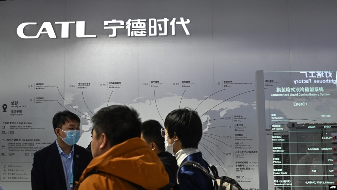 FILE - People visit the booth of Chinese battery maker CATL during the China International Supply Chain Expo in Beijing on Dec. 1, 2023
