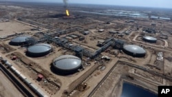 FILE - West Qurna oil field is seen in this aerial view, near the city of Basra, 340 miles (550 kilometers) southeast of Baghdad, Iraq, Feb. 21, 2017. 