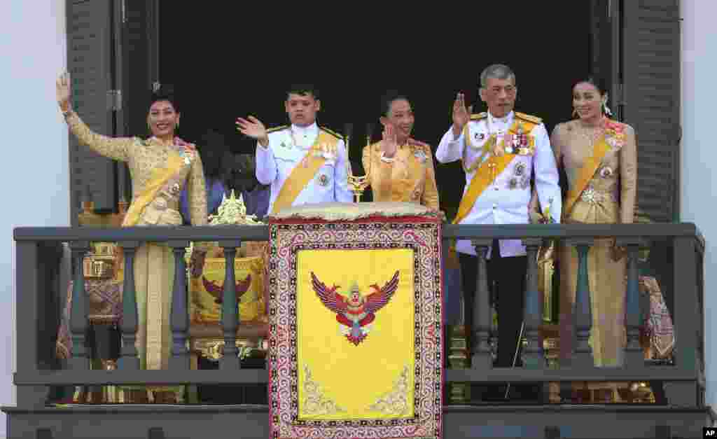 Thailand's royal family from left; Princess Sirivannavari Nariratana, daughter, Prince Dipangkorn Rasmijoti, son, Princess Bajrakitiyabha, daughter, King Maha Vajiralongkorn and Queen Suthida wave to an audience from the balcony of Suddhaisavarya Prasad Hall in the Grand Palace during the coronation ceremony in Bangkok.