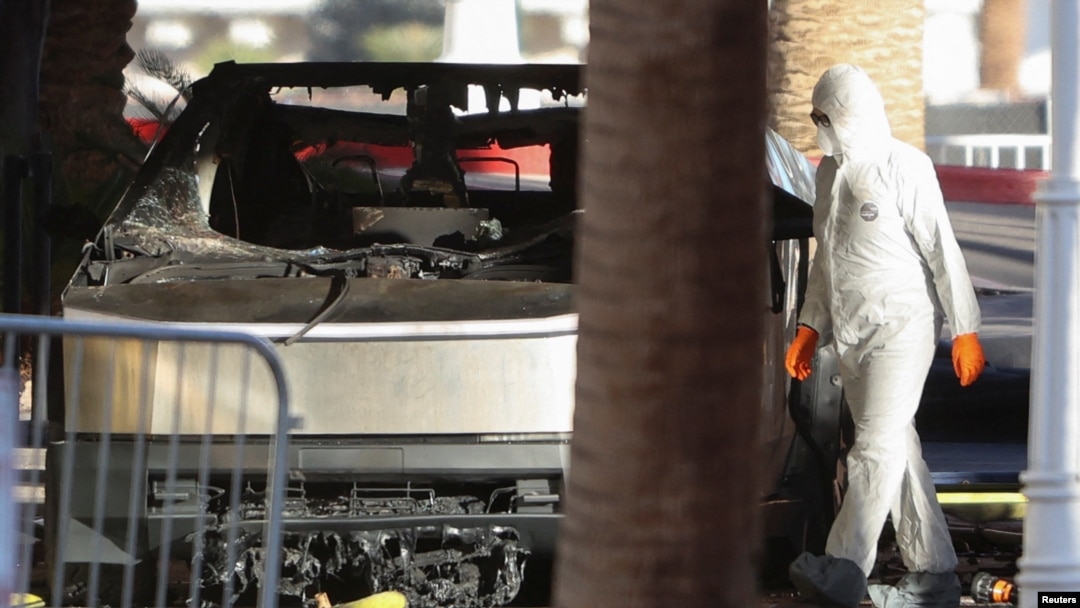 FILE - The remains of a Tesla Cybertruck that burned at the entrance of Trump Tower, are inspected in Las Vegas, Nevada, Jan. 1, 2025. Data from the vehicle helped law enforcement track the driver's movements. 