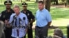 Boston Mayor Marty Walsh (R) holds a news conference with William Evans, Boston Police commissioner, in the Boston Commons in Boston, Massachusetts, Aug. 19, 2017.