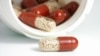 FILE - Antibiotic pills. Antimicrobial resistance occurs when antibiotics and other drugs that were once used successfully to treat bacteria, viruses, parasites and fungi no longer work to fight infections. Used improperly, the once-miracle drugs cause microbes to develop mutations that render them ineffective. 