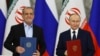 Президент Ирана Масуд Пезешкиан и президент России Владимир Путин на церемонии подписания в Кремле "Договора о всеобъемлющем стратегическом партнерстве"ю Москва, 17 января 2025 г. 