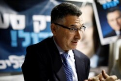 FILE - Gideon Saar, a popular Likud party member, speaks to supporters in Rishon Lezion, Israel, Dec. 26, 2019.