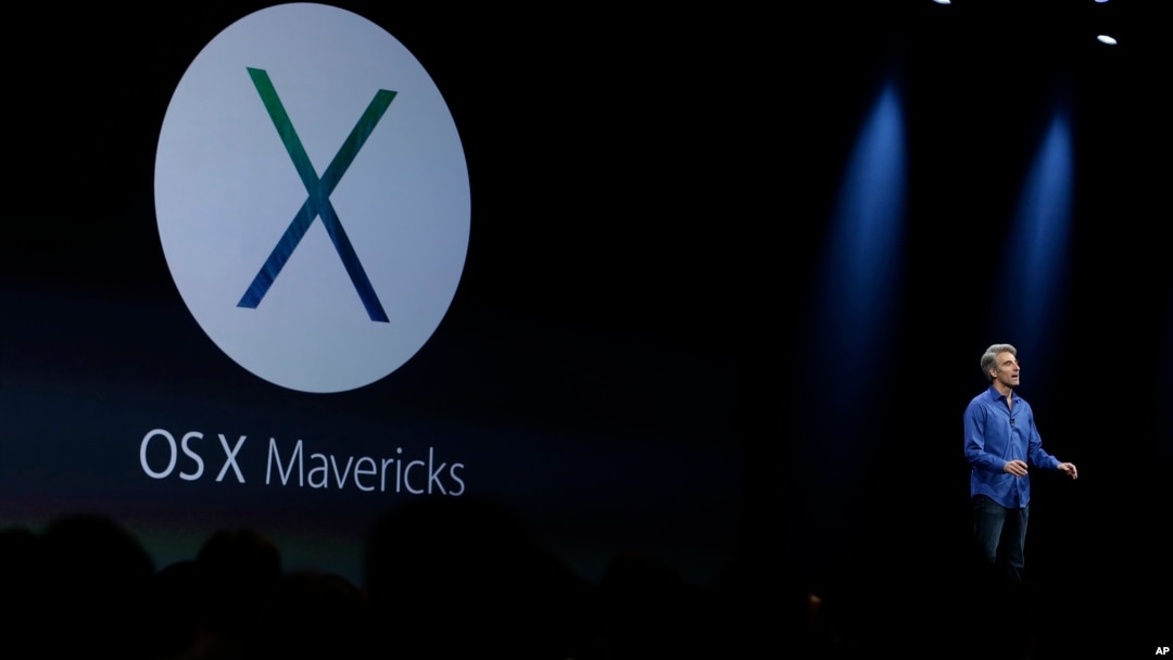 Craig Federighi, senior vice president of software engineering at Apple, introduces the new OS X Mavericks operating system during the keynote address of the Apple Worldwide Developers Conference,June 10 in San Francisco. (AP Photo/Eric Risberg)