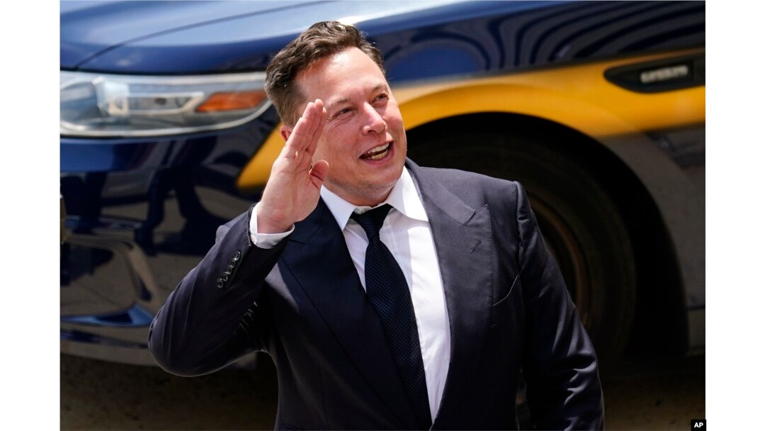 FILE - Tesla CEO Elon Musk departs from the justice center in Wilmington, Del., July 13, 2021.