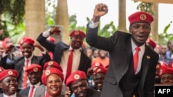 FILE - Singer turned politician Robert Kyagulanyi, also known as Bobi Wine, gestures during a press conference, held at his home in Magere in the outskirts of Kampala, July 24, 2019.