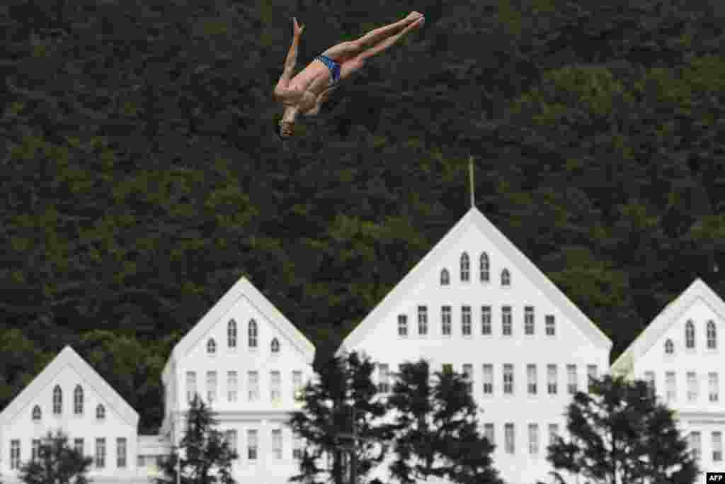 Britain's Gary Hunt competes in a round of the men's high diving event during the 2019 World Championships at Chosun University in Gwangju, South Korea.