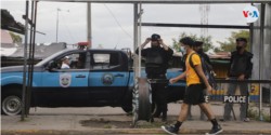 Policías patrullan las calles en Managua, Nicaragua, agosto de 2021. [Fotografía: Houston Castillo Vado]