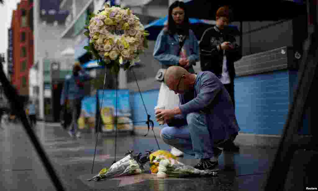 A person pays tribute to late actor Doris Day on the Hollywood Walk of Fame in Los Angeles, California, May 13, 2019.