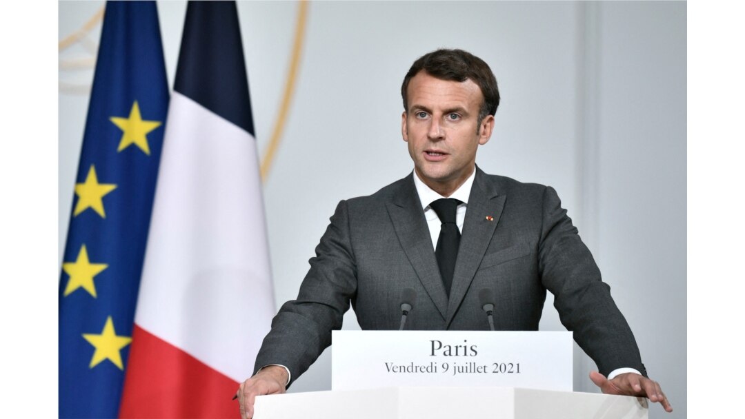 FILE - French President Emmanuel Macron speaks during a press conference at the Elysee Presidential Palace, in Paris, July 9, 2021.