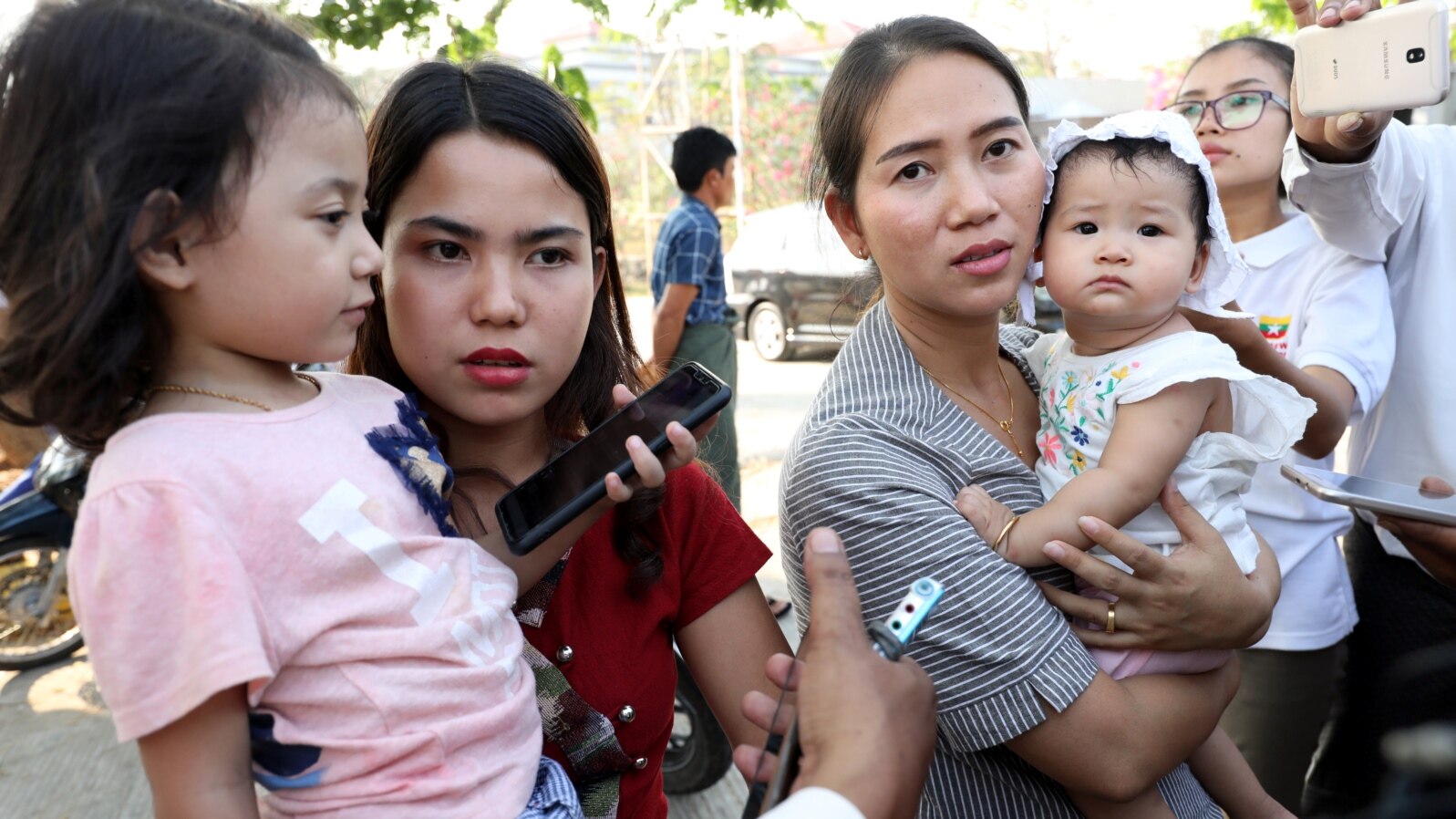 Families of jailed Reuters reporters Wa Lone and Kyaw Soe Oo talk to the media after attending a hearing at Myanmar's Supreme Court in Naypyitaw, Myanmar, March 26, 2019.