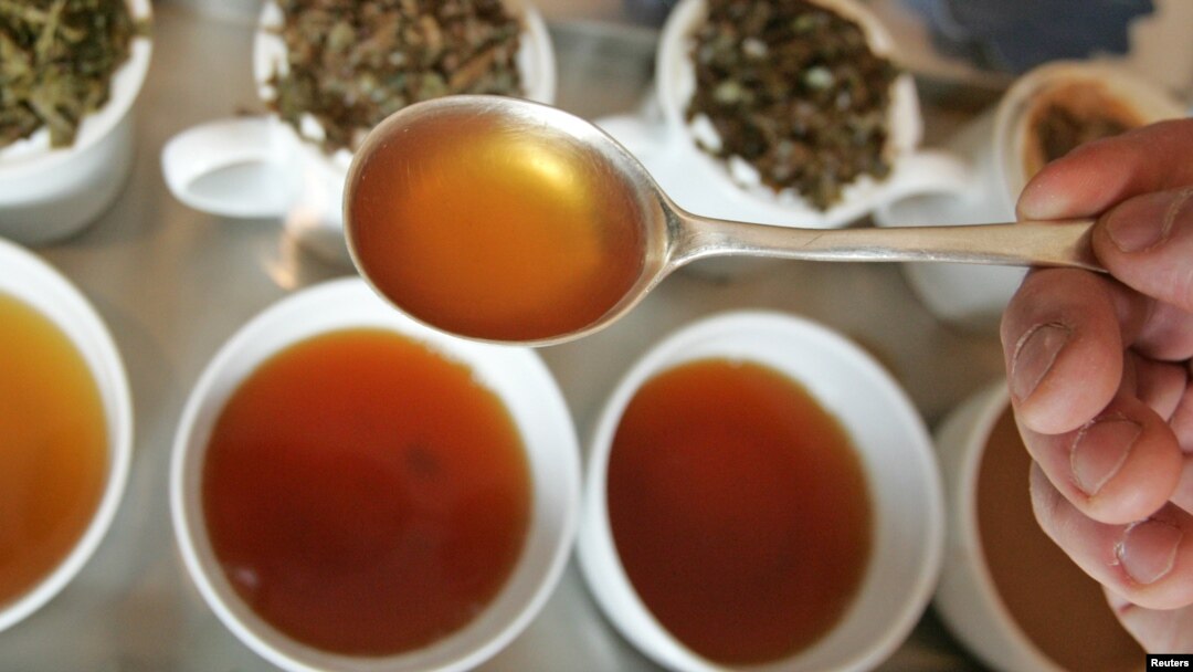 Tim Clifton, a tea broker and taster, samples different English grown and manufactured tea during a launch event at Kew Gardens in south west London.