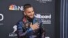 ARCHIVO - Maluma llega a los Premios de Música Billboard el miércoles 1 de mayo de 2019.