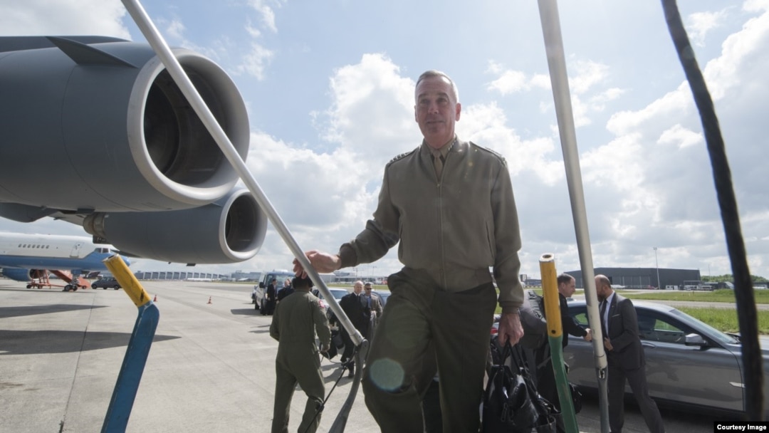 Joint Chiefs Chairman General Joe Dunford boards a C-17 military aircraft for the flight from Belgium to the United States, May 19, 2016. (DOD News)